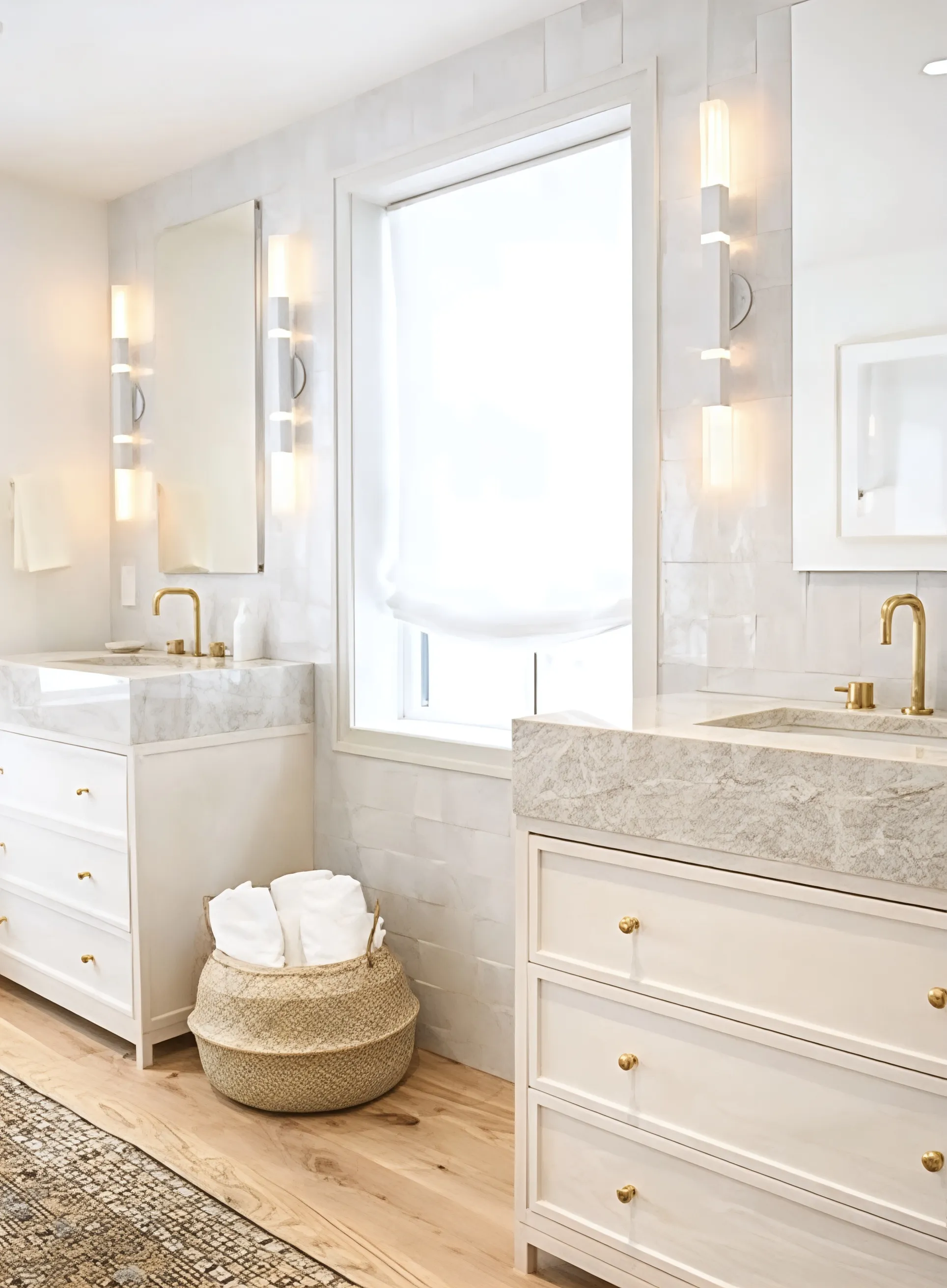 Double-vanity primary bathroom with marble counters, Heath Hill Road project in Brookline, MA