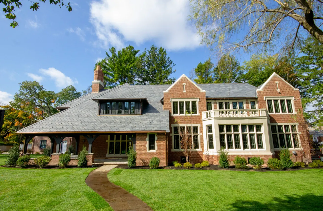 Historic brick estate exterior, Woodchester Drive project in Chestnut Hill, MA